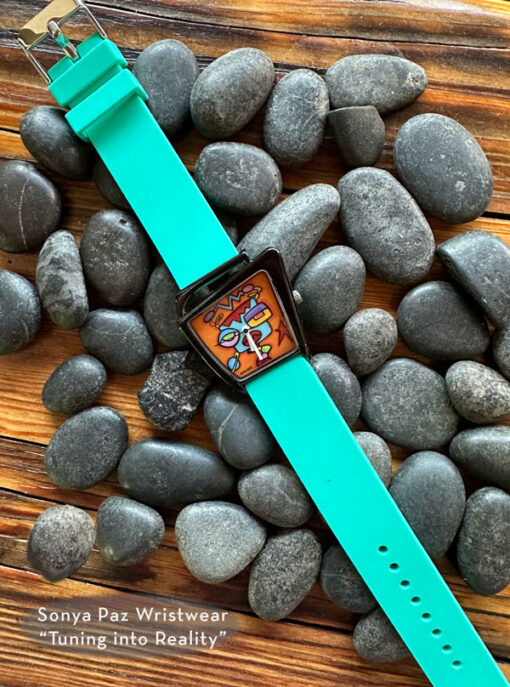 NEW - Tuning into Reality Wristwear with Teal Band!